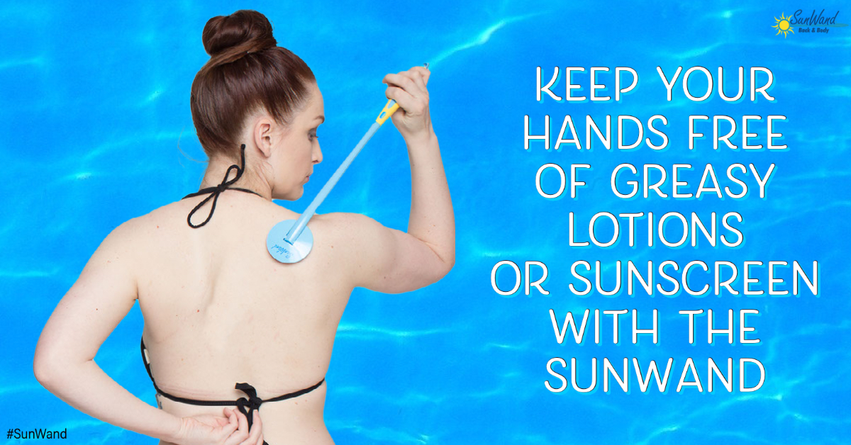 A woman using a device to put sunscreen on her back.